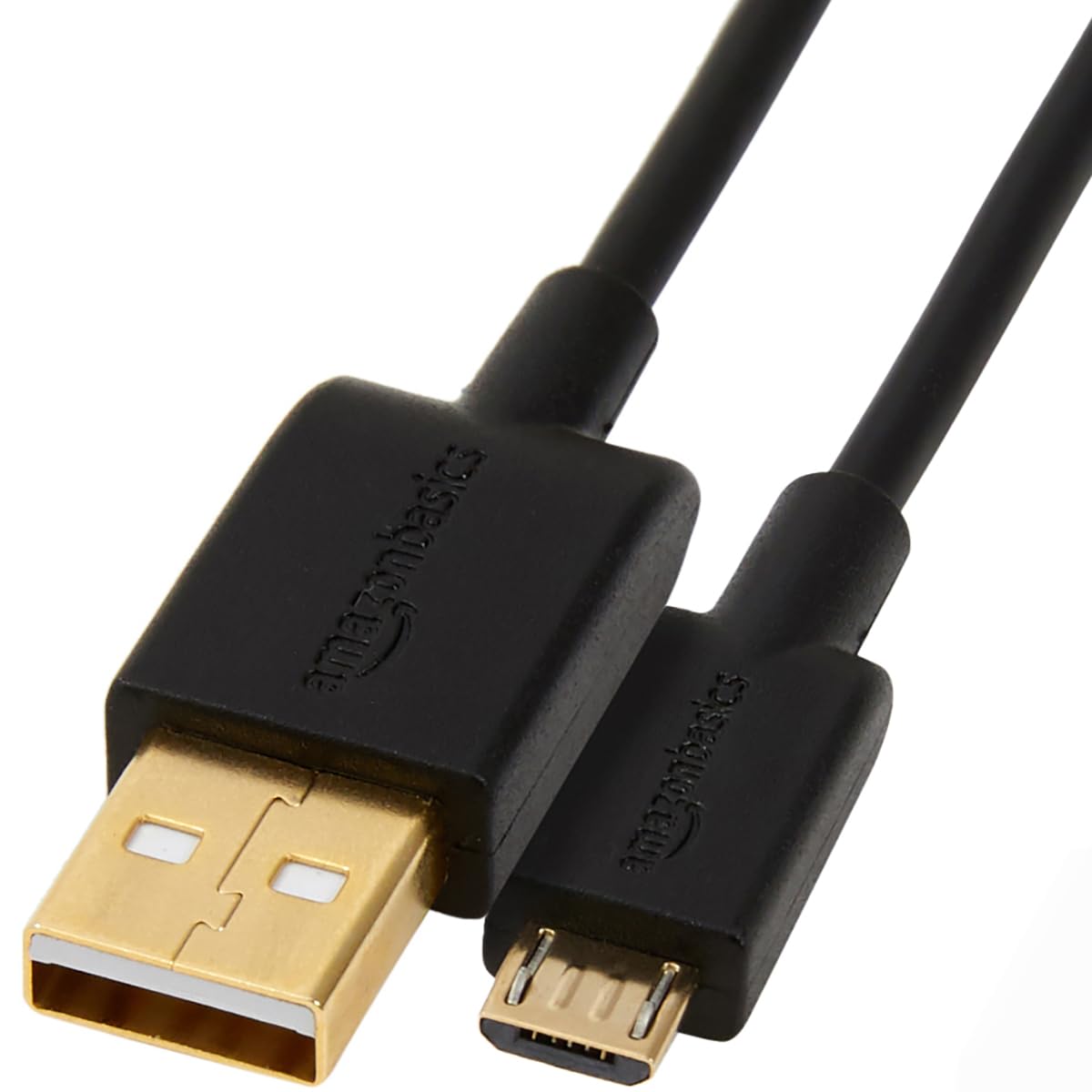A charging cable plugged into a Chromecast device.