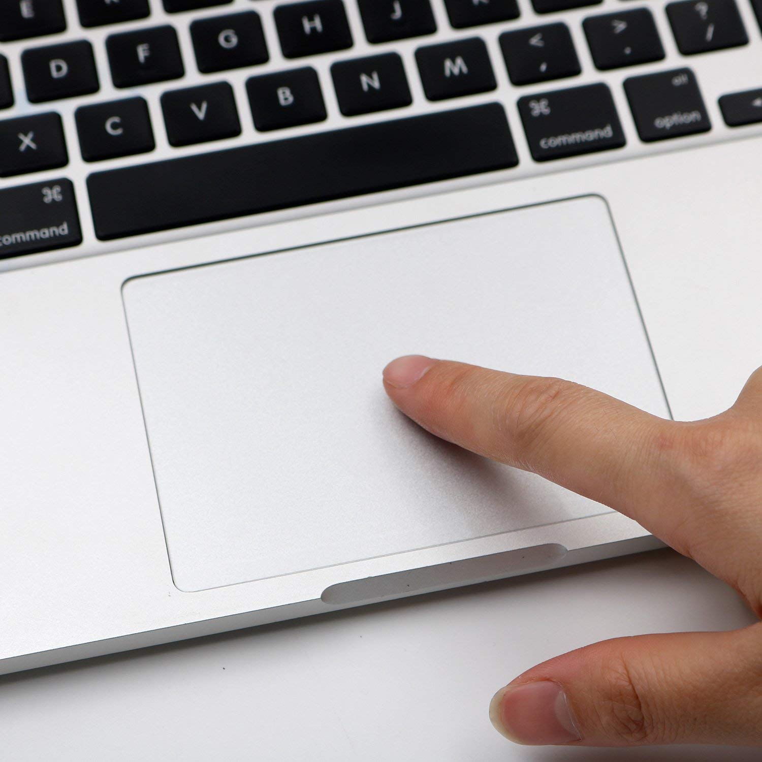 An image of a laptop touchpad icon or a finger touching a touchpad.