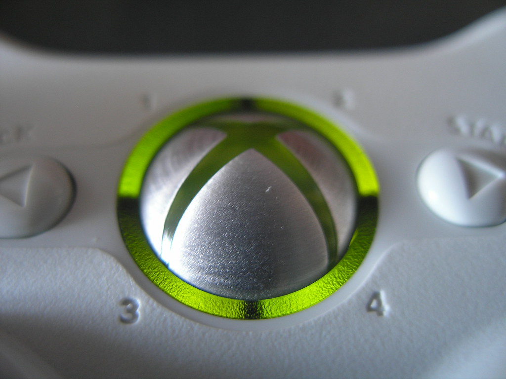 An image of an Xbox controller with a flashing light.