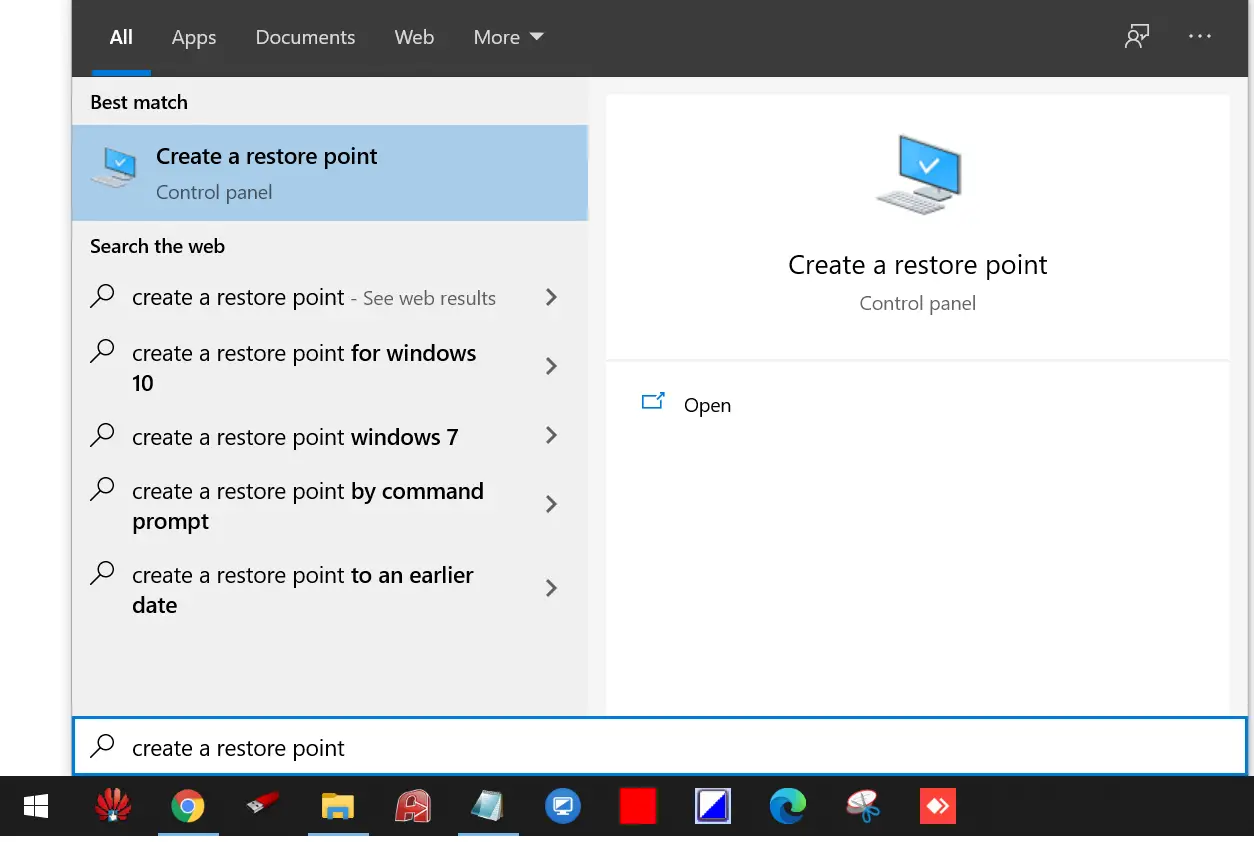 Click on the "Create a restore point" option that appears in the search results.
In the System Properties window, click on the "System Restore" button.
